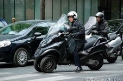 Hollande en scooter