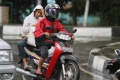 Les femmes interdites enfourcher roues Indonsie