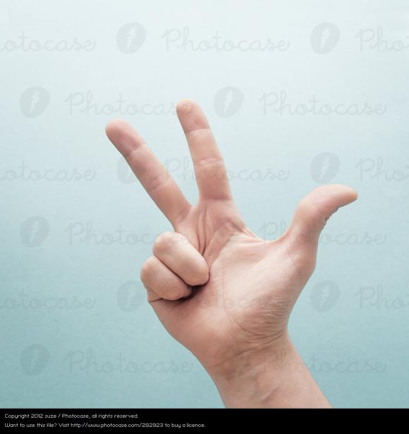 282923-hand-bright-arm-skin-3-fingers-communicate-cool-slang-photocase-stock-photo-large.jpeg