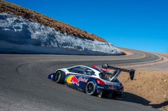 619325_le-francais-sebastien-loeb-en-reconnaissance-au-volant-de-sa-peugeot-208-t16-dans-la-course-de-cote-de-pikes-peak-le-9-juin-2013-dans-le-colorado.jpg